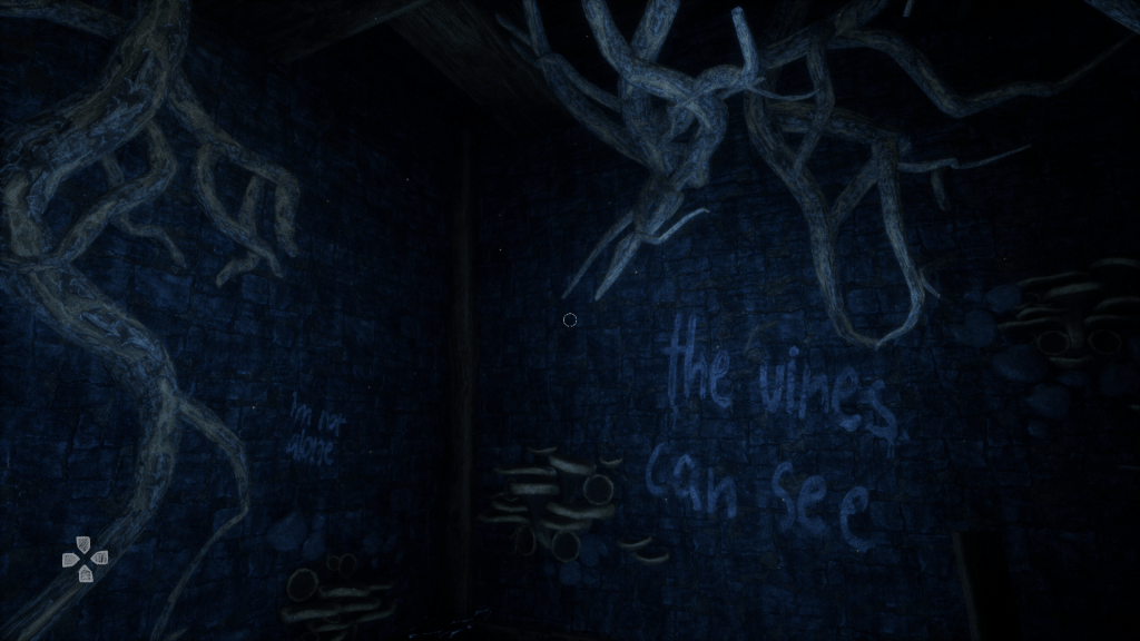 A poorly lit room with stone walls, and a wooden ceiling and supports. There are mushrooms growing on the walls, vines slithering down from the ceiling on both the left and right, and there's text written on the walls in a dirty off-white color, the text on the left reads "im not alone" and on the right it reads "the vines can see"
